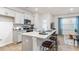 Bright and airy kitchen with stainless steel appliances, granite countertops, and an island with seating for casual dining at 1910 Frost Dr, Haw River, NC 27258