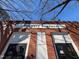 Brick building with Brewery Bhavana signage, promising a unique brewery experience with dual entrances at 200 S Dawson St # 103, Raleigh, NC 27601