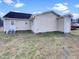View of the home's exterior with a well-maintained yard at 2042 Compacta Dr, Wendell, NC 27591