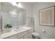 Well-lit bathroom featuring a single sink, quartz countertop, framed artwork, and modern fixtures at 26 Kitty Branch Way, Smithfield, NC 27577