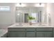 Elegant bathroom featuring dual sinks, quartz countertops, modern fixtures, and a bright open space at 26 Kitty Branch Way, Smithfield, NC 27577