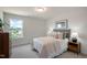 Bright bedroom features a large window and stylish decor at 26 Kitty Branch Way, Smithfield, NC 27577