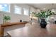 Open-concept dining area with natural light, hardwood floors, and access to the kitchen at 26 Kitty Branch Way, Smithfield, NC 27577
