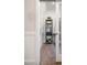 Hallway view with built-in shelving and slider door to office at 26 Kitty Branch Way, Smithfield, NC 27577