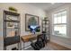 Comfortable office featuring natural light, shelving and modern decor at 26 Kitty Branch Way, Smithfield, NC 27577