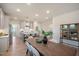 Spacious, open-concept layout featuring dining area, kitchen with island, and hardwood floors at 26 Kitty Branch Way, Smithfield, NC 27577