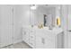 Bright bathroom featuring a double sink vanity with modern fixtures at 2612 Nordmann Fir Rd, Raleigh, NC 27616