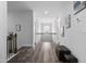 Upstairs hallway with hardwood floors and decor at 2612 Nordmann Fir Rd, Raleigh, NC 27616