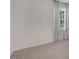Bright bedroom featuring a neutral color scheme, carpet floors, and plenty of natural light at 273 Hawksmoore Ln, Lillington, NC 27546
