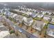 An aerial view of a residential street with well-maintained homes and lawns at 2815 Mebane Ln, Durham, NC 27703
