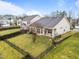 A charming backyard with a patio and green lawn at 2815 Mebane Ln, Durham, NC 27703