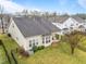 An aerial view of the backyard featuring lawn, patio, landscaping, and fencing at 2815 Mebane Ln, Durham, NC 27703