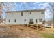 The home features a spacious backyard with a raised deck that is perfect for outdoor entertainment at 296 Trenburg Pl, Clayton, NC 27520