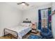 bedroom with hardwood floors, bright window, and playful decorations at 296 Trenburg Pl, Clayton, NC 27520