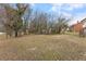 The backyard view shows the lot and neighborhood at 318 Fulton St, Burlington, NC 27217