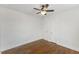 Spacious bedroom with ceiling fan, hardwood floors, and closet at 318 Fulton St, Burlington, NC 27217