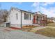 Charming single-story home featuring a welcoming porch and well-maintained lawn at 318 Fulton St, Burlington, NC 27217