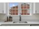 New kitchen with a bright white countertop, backsplash, and faucet fixtures at 318 Fulton St, Burlington, NC 27217