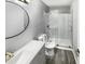 Bathroom featuring a modern vanity, and a walk-in shower with glass door at 4213 Sunscape Ln, Raleigh, NC 27613