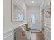 Bright entryway with hardwood floors, bench seating and an elegant front door at 464 Granite Saddle Dr, Rolesville, NC 27571
