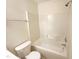 Clean bathroom features a shower-tub combo with white tile surround at 5107 Tomasita Ct, Raleigh, NC 27616