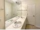 Bathroom featuring a large mirror and a double sink vanity with white countertops at 5107 Tomasita Ct, Raleigh, NC 27616