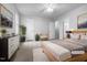 Bright bedroom featuring a ceiling fan, soft carpet, and a cozy, neutral color palette at 516 Caprice Ct, Raleigh, NC 27606