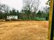 Cleared lot ready for construction, showing the expansive potential of this ideal building site, surrounded by natural beauty at 5849 Genesee Dr., Homesite 3, Durham, NC 27712