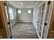Bright office space with luxury vinyl plank flooring, french doors and lots of natural light at 5849 Genesee Dr., Homesite 3, Durham, NC 27712