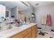 Bathroom with double vanity, countertop, sink, and mirror at 589 Vinson Rd, Clayton, NC 27527