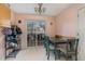 Cozy dining nook adjacent to the kitchen with sliding glass door at 589 Vinson Rd, Clayton, NC 27527
