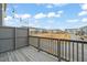 View from the back porch of a residential community with string lights and wood railings at 5908 Giddings St, Raleigh, NC 27616