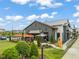 Exterior view of establishment with outdoor patio and landscaping showing a pleasant community gathering space at 5908 Giddings St, Raleigh, NC 27616
