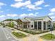 Exterior shot of the building with outdoor picnic benches under a covered patio at 5908 Giddings St, Raleigh, NC 27616