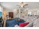 Spacious living room featuring an open floor plan, comfortable seating, and a staircase at 5908 Giddings St, Raleigh, NC 27616