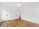 Bright bedroom has a ceiling fan, hardwood floors, and closet at 6302 Linville Dr, Raleigh, NC 27606