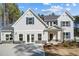 Charming two-story home with attractive gray siding, beautiful landscaping, and a welcoming front entrance at 67 Rice Road # 01, Zebulon, NC 27597