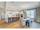 Open-concept kitchen and dining area with modern appliances and natural light at 67 Rice Road # 01, Zebulon, NC 27597