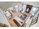 Open concept living room and kitchen, with fireplace, island, and dining area at 67 Rice Road # 01, Zebulon, NC 27597