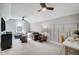 Cozy living room features modern ceiling fans, neutral walls, and comfortable seating area at 67 Rice Road # 01, Zebulon, NC 27597