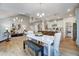 Open floor plan showcasing living room, kitchen, and dining area with modern finishes at 67 Rice Road # 01, Zebulon, NC 27597