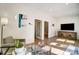 Comfortable lobby with stylish seating, modern lighting, and a television at 67 Rice Road # 01, Zebulon, NC 27597