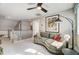 Upper level loft with seating area and views of the staircase and lower level at 67 Rice Road # 01, Zebulon, NC 27597
