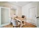 Well-lit home office features a desk, chairs, and a window for natural light at 67 Rice Road # 01, Zebulon, NC 27597