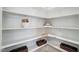 Spacious walk-in pantry with ample shelving for storage and organization at 67 Rice Road # 01, Zebulon, NC 27597