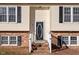 Close-up of the home's entrance, with the door and front steps in view at 7 Misty Creek Ct, Durham, NC 27705
