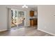 This kitchen features a sliding glass door to a deck, offering a seamless transition to outdoor living at 7 Misty Creek Ct, Durham, NC 27705