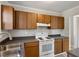 Functional kitchen design with ample counter space, offering a practical layout for cooking and meal preparation at 7 Misty Creek Ct, Durham, NC 27705