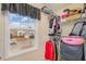 Walk-in closet offering plenty of storage space with shelving and hanging racks at 702 Blue Lake Dr, Mebane, NC 27302