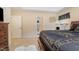 Spacious main bedroom showing a large bed, dresser, and ample natural light at 702 Blue Lake Dr, Mebane, NC 27302